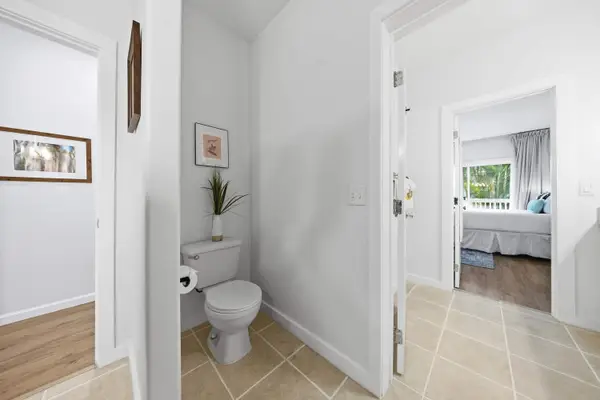 Half Bath with View into Bedroom