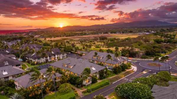 Sunset Over the Mountains and Resort Rooftops