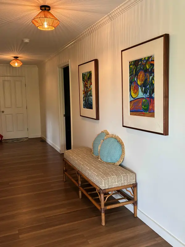 Bench seating located in hallway off front entryway