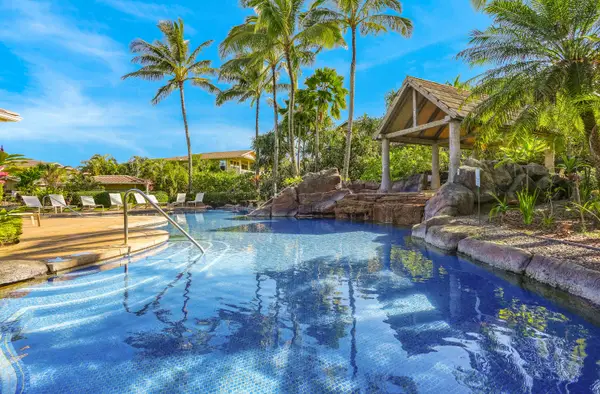Swim, relax and enjoy a large pool, hot tub and covered area