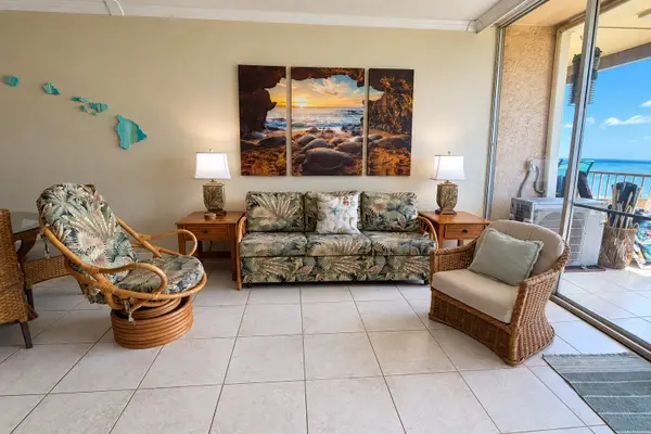 Unwind into vacation mode on a sleeper sofa in the living area with access to the lanai