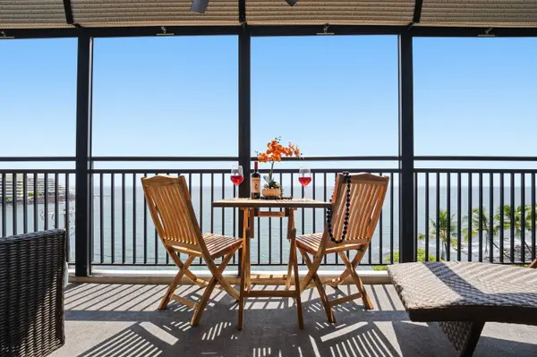 Lanai with ocean views and seating
