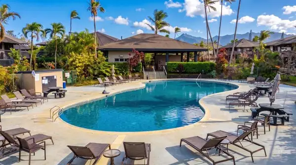 Beautiful & clean pool area with lush gardens and seating
