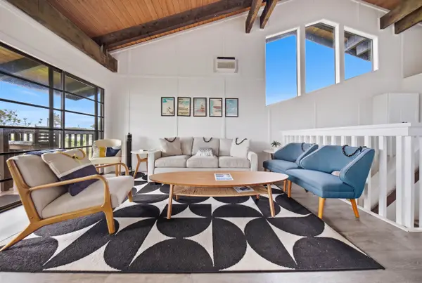 Living room with sofa bed and additional seating