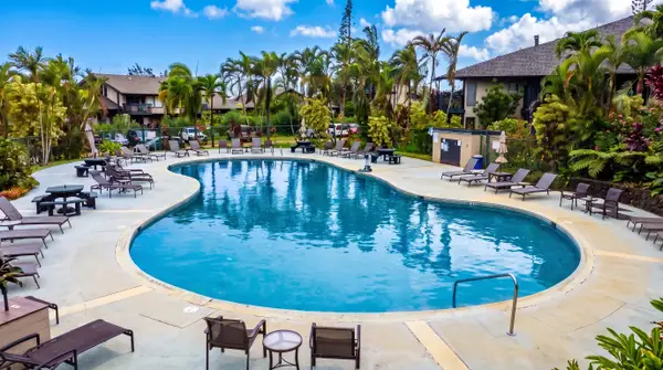 Mauna Kai pool with seating and garden landscape