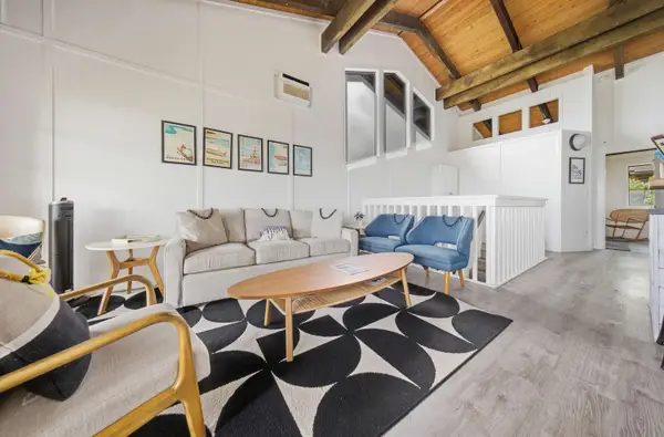 Living room with sofa bed and additional seating