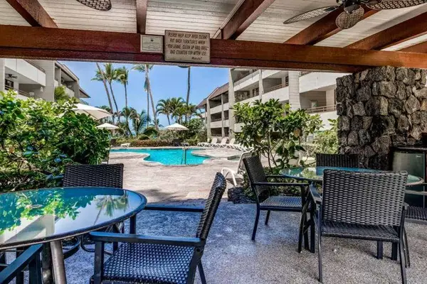 Covered outdoor dining near pool