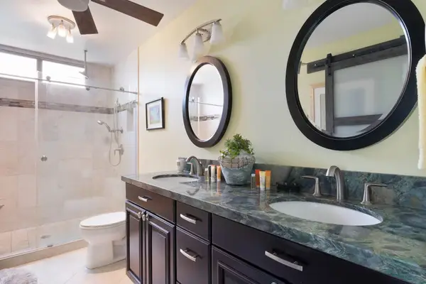 Spacious Bathroom with Large Double Vanity & Glass-Enclosed Shower