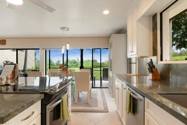 Spacious Kitchen Layout Opening Up to the Dining Area