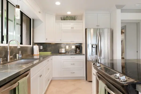 Modern Kitchen Featuring Stainless Steel Appliances & Ample Counter Space