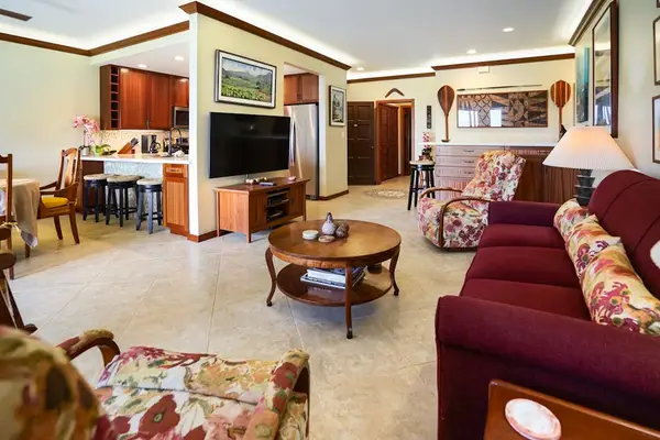 Living room with sofa bed for extra guests and a flat screen tv.