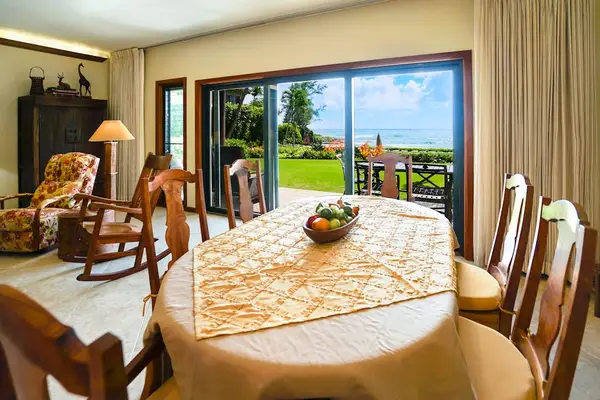 Dining room with seating for six while you take in the tropical views out the sliding glass door.