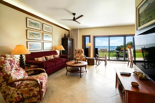 Living room with sofa bed for extra guests and a flat screen tv.