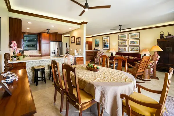 Dining room with seating for six while you take in the tropical views out the sliding glass door.
