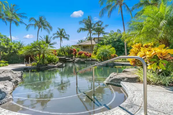 Resort Pool With Lush Island Landscaping