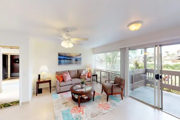 Living room with lots of natural light from the lanai