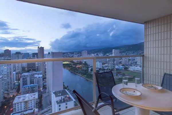 Admire the twinkling city lights from the comfort of your private balcony.