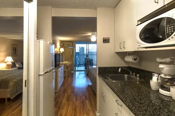 Make simple breakfasts, refreshments, and easy meals in this thoughtfully arranged kitchenette.