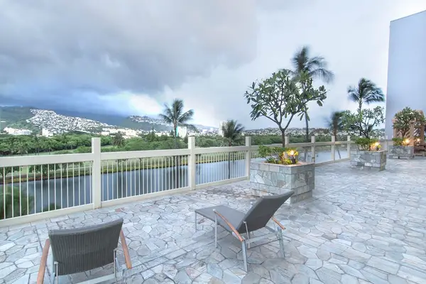 Relax on the shared pool deck while taking in breathtaking panoramic views of the island.