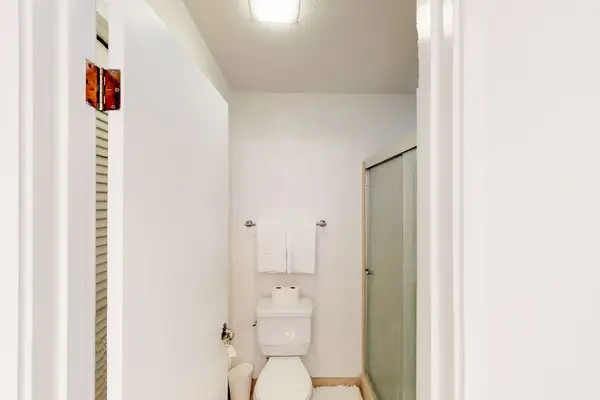 Full bathroom with walk in shower.