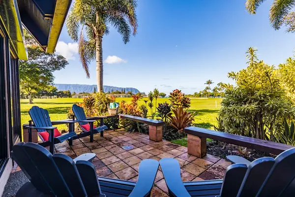 Outdoor Lounge Framed By Island Beauty