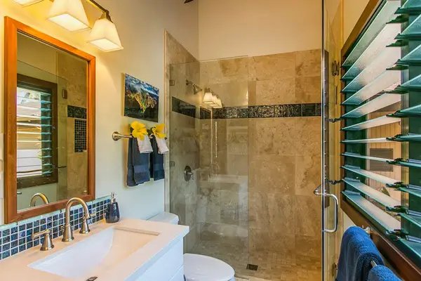 Elegant Bathroom With Tropical Finishes
