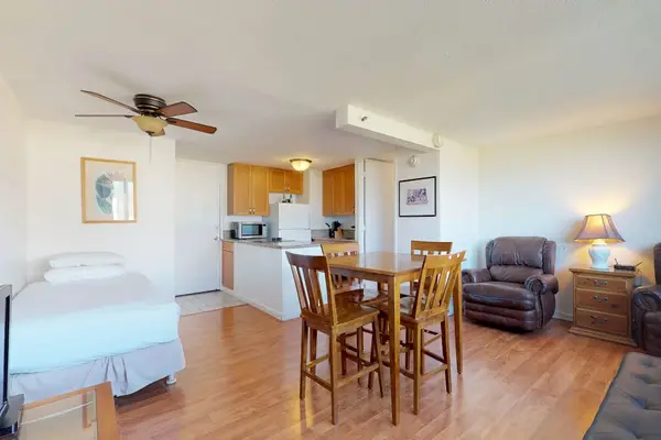 This open-concept studio layout thoughtfully incorporates an additional twin bed alongside the lounge area to accommodate extra guests.