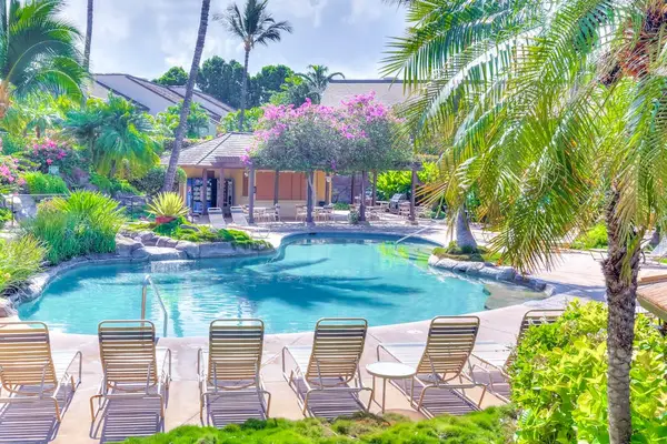 Lagoon-Style Resort Pool surrounded by Lush Gardens