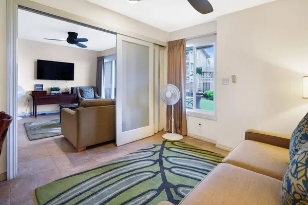 Spacious living room with smart TV for movie nights