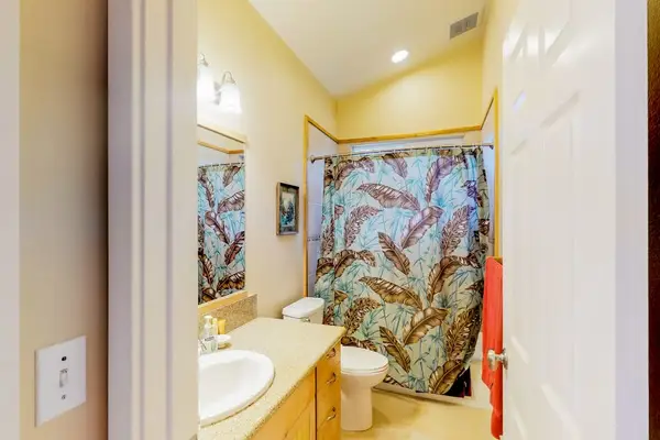 Bright Full Bathroom With Shower Tub