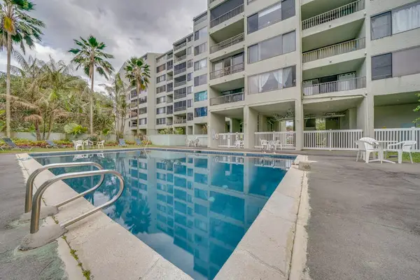 Refreshing pool with lounge chairs nearby