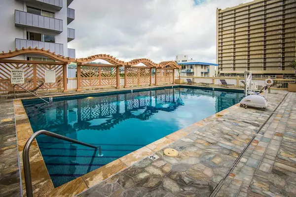 Enjoy sunny days by the resort-style pool, perfect for swimming, lounging, and relaxing outdoors.