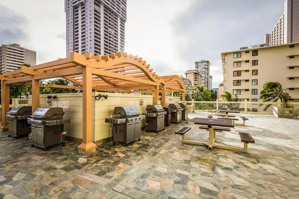 Fire up the grill and share delicious outdoor meals in this welcoming gathering space.