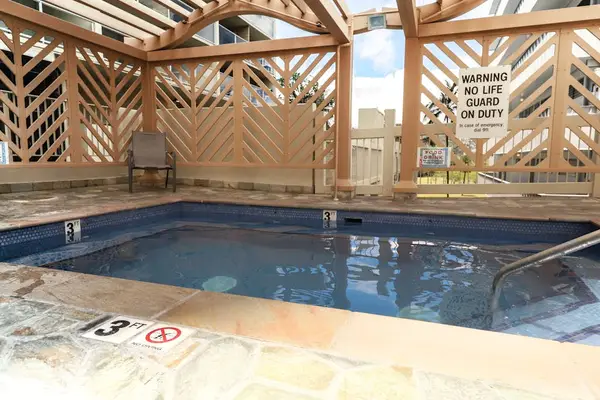 Soothe your muscles with a relaxing soak in the community hot tub.