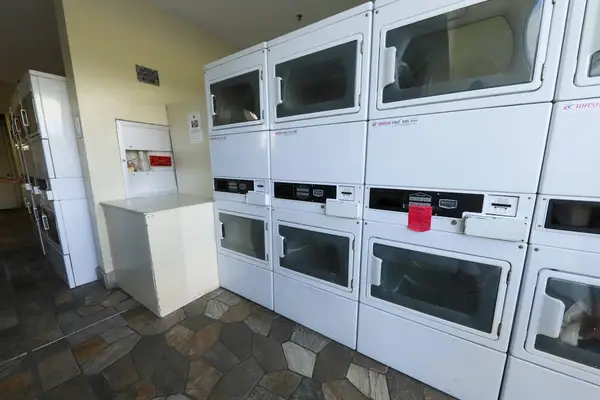 On-site community laundry facilities add convenience to longer stays.
