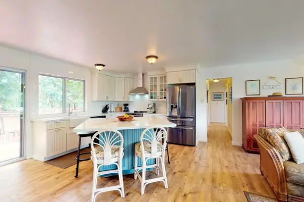 Kitchen island with barstools for extra seating.