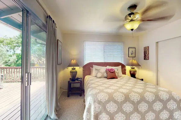 Master bathroom with king bed and an en-suite bathroom.