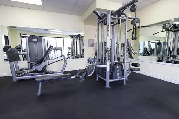 Stay active in the shared gym featuring modern cardio and strength-training equipment.