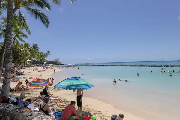 Waikiki Beach is just a short walk away, offering soft sand, calm waters, and stunning ocean views.