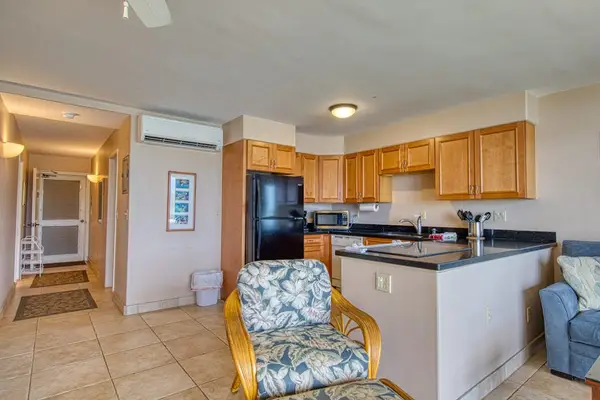 Spacious Kitchen With Breakfast Bar