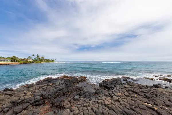 Panoramic Ocean Views Over Lava Rocks
