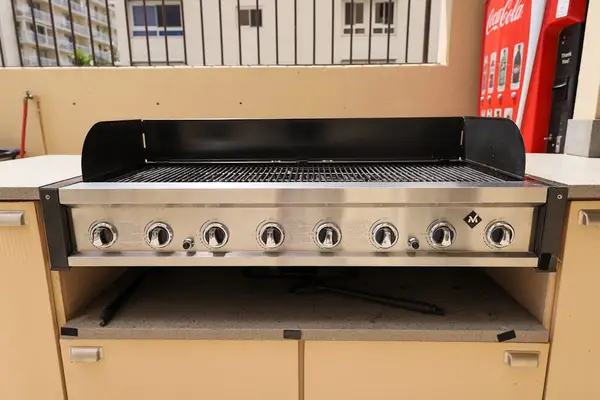 Grill favorite dishes in the welcoming shared BBQ area