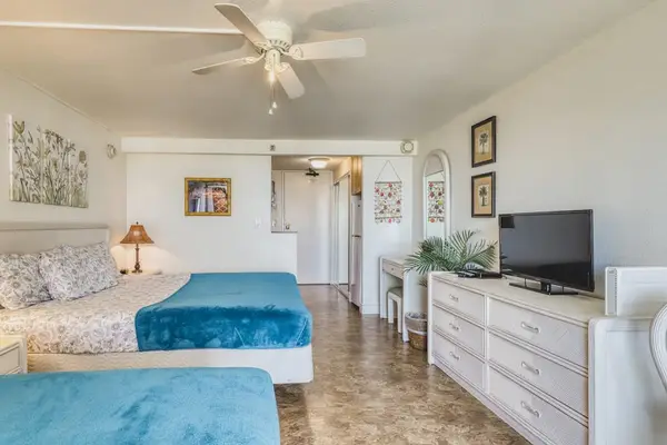 Bright and airy studio designed for a relaxing island getaway.