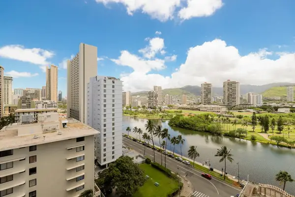 Enjoy scenic canal, city, and mountain views from the balcony.