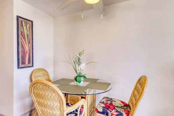 Enjoy meals together in the bright dining area with comfortable seating for four guests.
