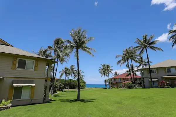 Enjoy a beautiful view of the unit from the pool area, creating a relaxing and inviting atmosphere.