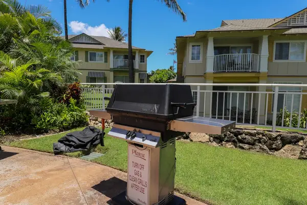 Enjoy outdoor cooking and gatherings with access to the shared BBQ grill area.