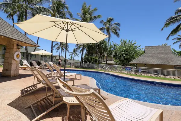 Take a refreshing dip and unwind by the shared pool, perfect for relaxing and enjoying sunny days.