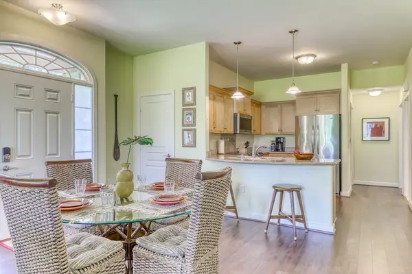 A versatile area where guests can prepare meals, enjoy conversations, and feel right at home.