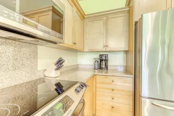 A convenient culinary space perfect for preparing meals and enjoying time together.